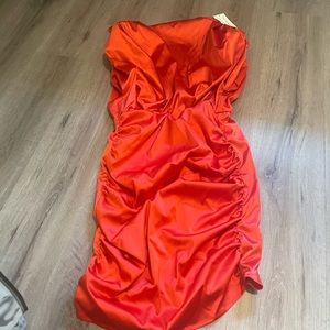 Glamaker dress with shoulder pads. Size large. Red. New with tags. Never worn.